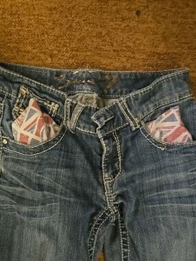 7seven Women’s Blue Distressed Denim Jeans with Union Jack Pocket Accent Size 27